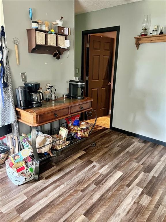 400 S 7th St, Arma, KS 66712 - bar area featuring wood finished floors