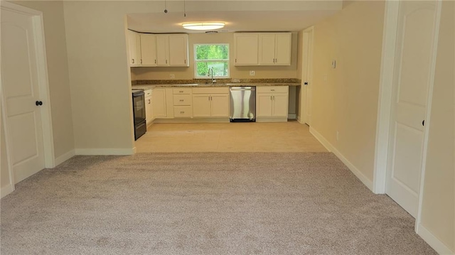 208 W Marshall St, Mayview, MO 64071 - kitchen featuring dishwasher, a sink, light carpet, baseboards, and black / electric stove