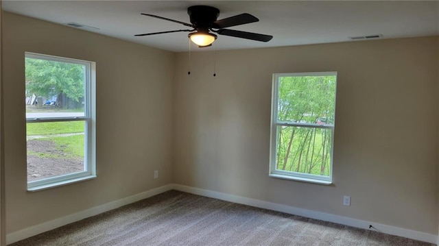 208 W Marshall St, Mayview, MO 64071 - carpeted spare room with baseboards and ceiling fan