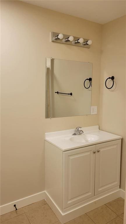 208 W Marshall St, Mayview, MO 64071 - bathroom featuring baseboards, vanity, and tile patterned flooring