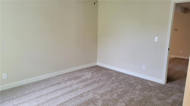 208 W Marshall St, Mayview, MO 64071 - unfurnished room featuring carpet floors and baseboards