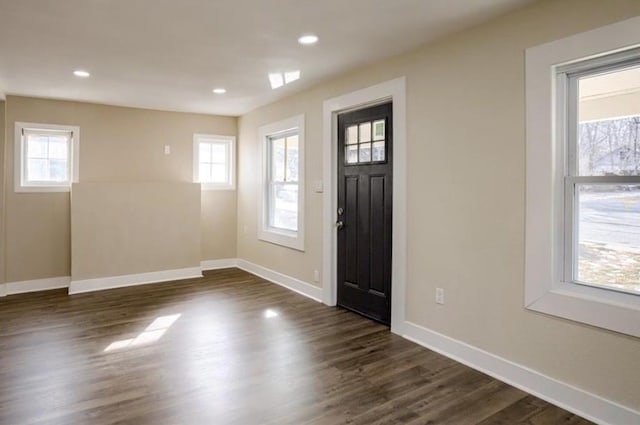 4204 E 60th Ter, Kansas City, MO 64130 - entryway featuring baseboards, dark wood-style floors, and recessed lighting