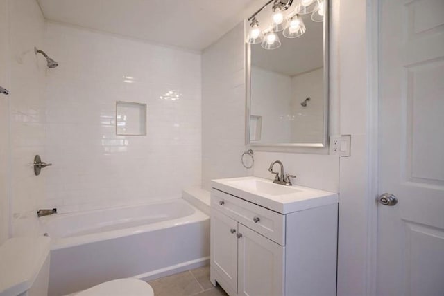 4204 E 60th Ter, Kansas City, MO 64130 - full bath with vanity, toilet, washtub / shower combination, and tile patterned flooring