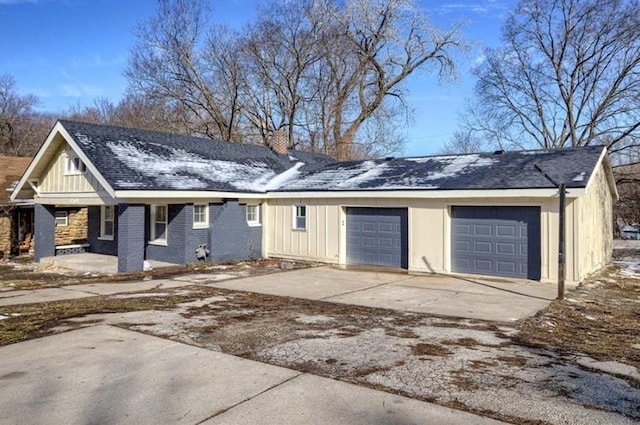 4204 E 60th Ter, Kansas City, MO 64130 - garage featuring driveway