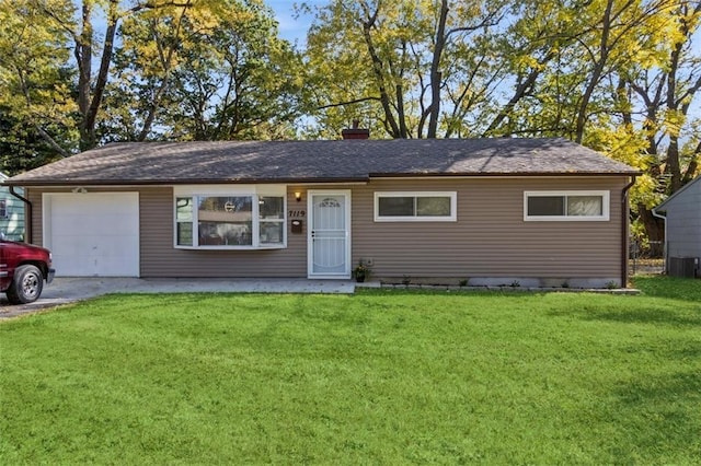 7119 E 111th Ter, Kansas City, MO 64134 - ranch-style house with a garage, a front lawn, and a chimney