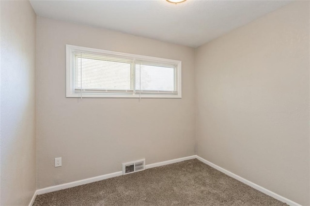 7119 E 111th Ter, Kansas City, MO 64134 - spare room with plenty of natural light, carpet, and baseboards