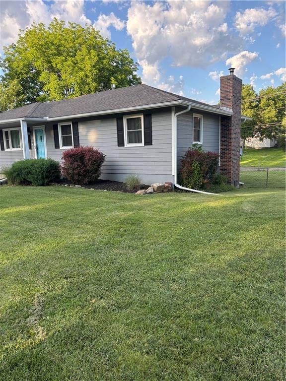 1015 S Elm St, Ottawa, KS 66067 - ranch-style house featuring a chimney