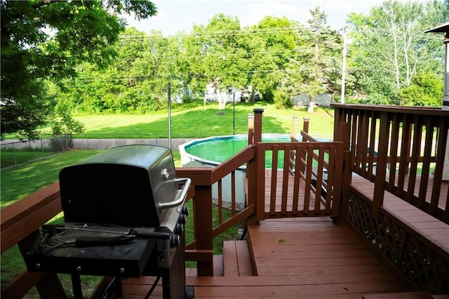 1015 S Elm St, Ottawa, KS 66067 - wooden deck with area for grilling