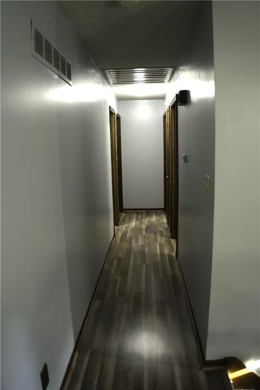 1015 S Elm St, Ottawa, KS 66067 - hallway with dark wood finished floors