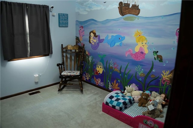 1015 S Elm St, Ottawa, KS 66067 - rec room with carpet flooring and baseboards