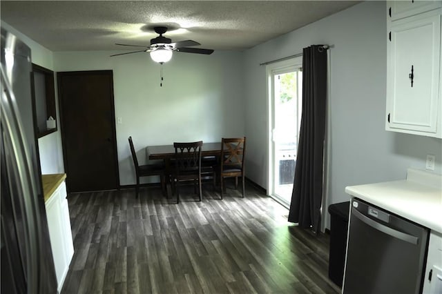 1015 S Elm St, Ottawa, KS 66067 - dining area featuring a textured ceiling, dark wood-type flooring, and a ceiling fan