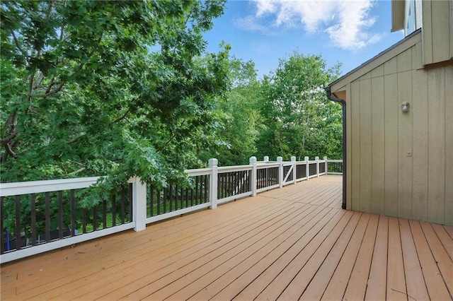 7407 W 145th Ter, Overland Park, KS 66223 - wooden deck with view of scattered trees