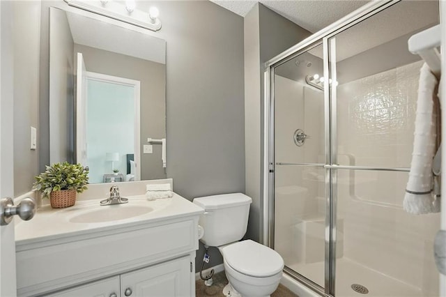 7407 W 145th Ter, Overland Park, KS 66223 - bathroom featuring a shower stall, vanity, and toilet