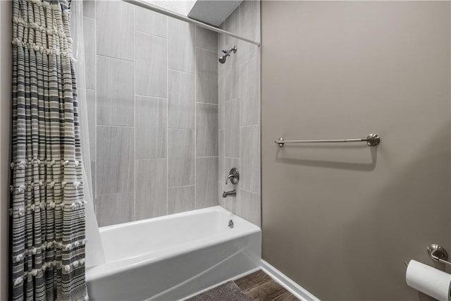 1728 SE 7th Ter, Lees Summit, MO 64063 - full bath featuring shower / tub combo, baseboards, and wood finished floors