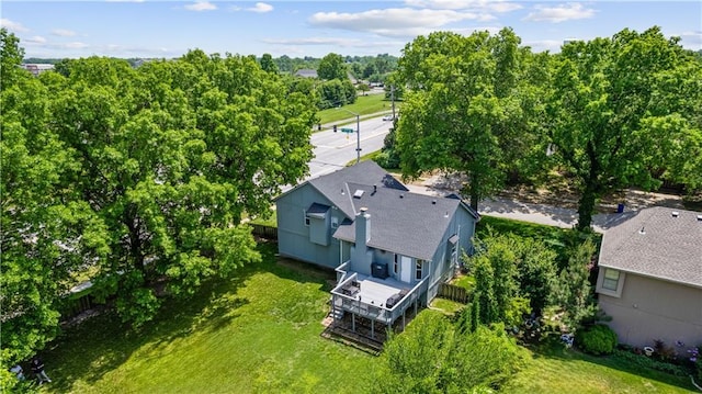 1728 SE 7th Ter, Lees Summit, MO 64063 - view of subject property with a tree filled landscape