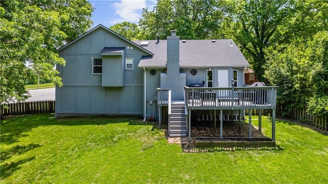 1728 SE 7th Ter, Lees Summit, MO 64063 - back of property featuring a wooden deck, stairway, a chimney, and roof with shingles