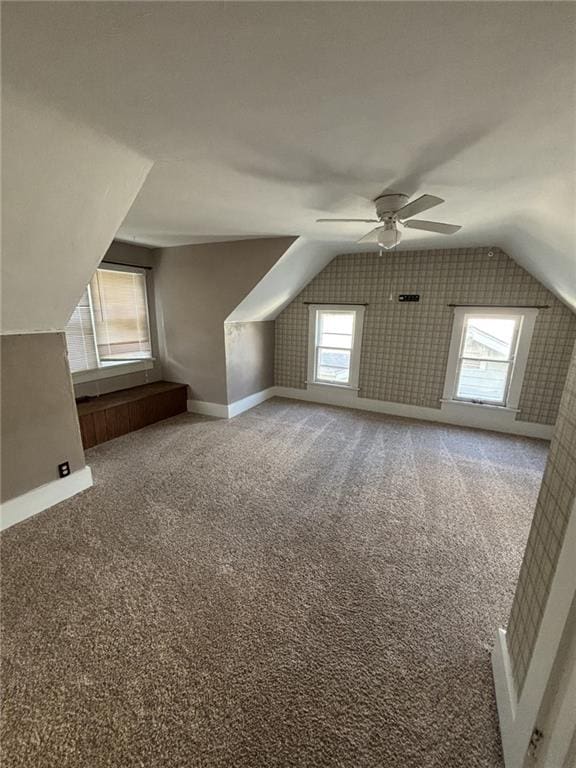 611 W Main St, Chanute, KS 66720 - additional living space with lofted ceiling, a ceiling fan, carpet, and baseboards