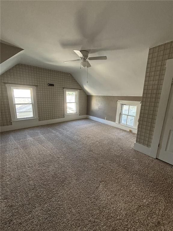 611 W Main St, Chanute, KS 66720 - bonus room with lofted ceiling, a ceiling fan, baseboards, and carpet floors