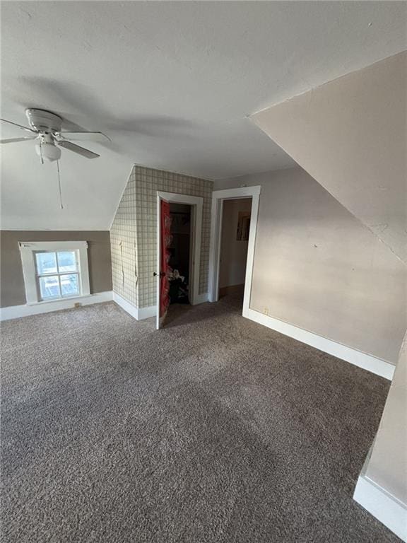 611 W Main St, Chanute, KS 66720 - additional living space with baseboards, carpet flooring, and a ceiling fan