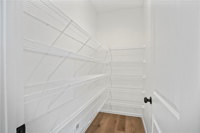 12513 S White Ash Ln, Lees Summit, MO 64086 - spacious closet with wood finished floors