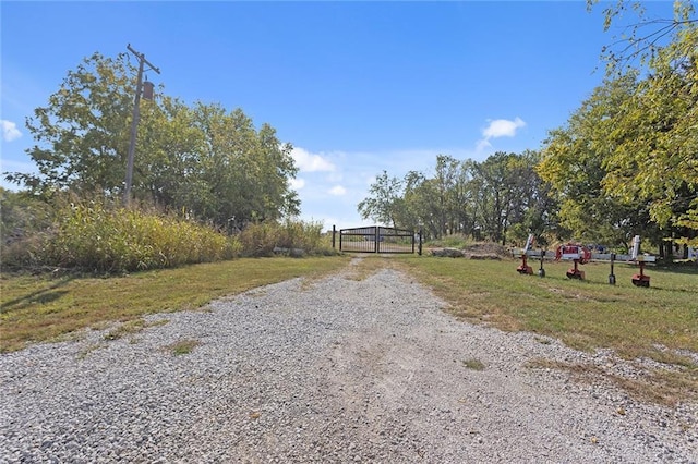 411 E 203rd St, Belton, MO 64012 - view of street featuring a gate