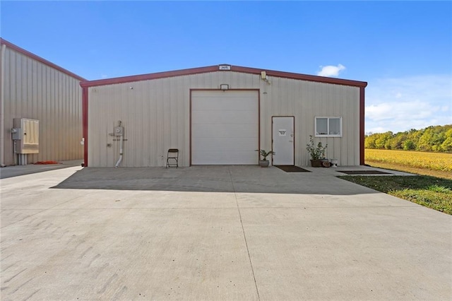 411 E 203rd St, Belton, MO 64012 - view of outdoor structure with concrete driveway