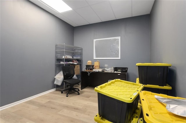 411 E 203rd St, Belton, MO 64012 - office space featuring wood finished floors, a paneled ceiling, and baseboards