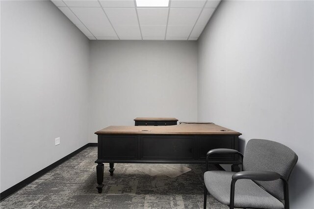 411 E 203rd St, Belton, MO 64012 - home office featuring a paneled ceiling, baseboards, and carpet flooring
