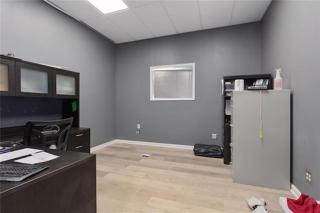 411 E 203rd St, Belton, MO 64012 - office featuring light wood-style flooring, baseboards, and a drop ceiling