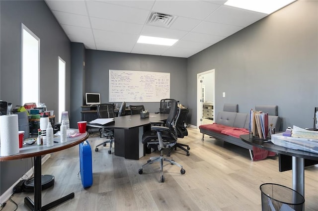 411 E 203rd St, Belton, MO 64012 - office area featuring a paneled ceiling and light wood-style flooring