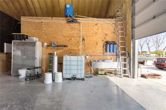 411 E 203rd St, Belton, MO 64012 - garage with wood walls