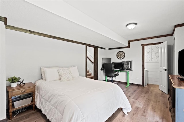 8801 NE 116th St, Kansas City, MO 64157 - bedroom featuring light wood finished floors and ornamental molding