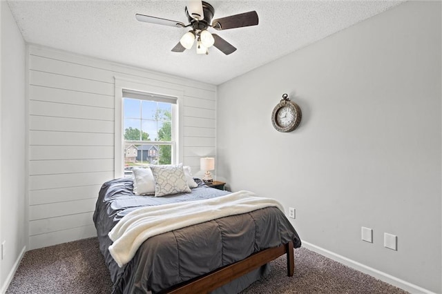 8801 NE 116th St, Kansas City, MO 64157 - bedroom with carpet, a textured ceiling, and ceiling fan