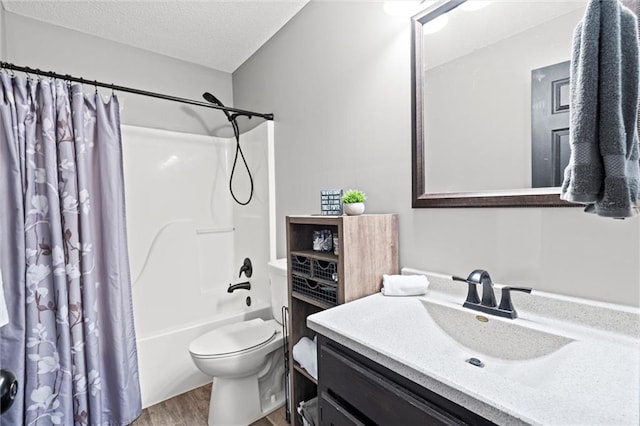 8801 NE 116th St, Kansas City, MO 64157 - bathroom featuring wood finished floors, vanity, shower / bathtub combination with curtain, and a textured ceiling