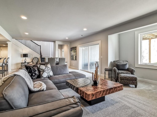 3248 W 133rd Ter, Leawood, KS 66209 - carpeted living area with stairs and recessed lighting
