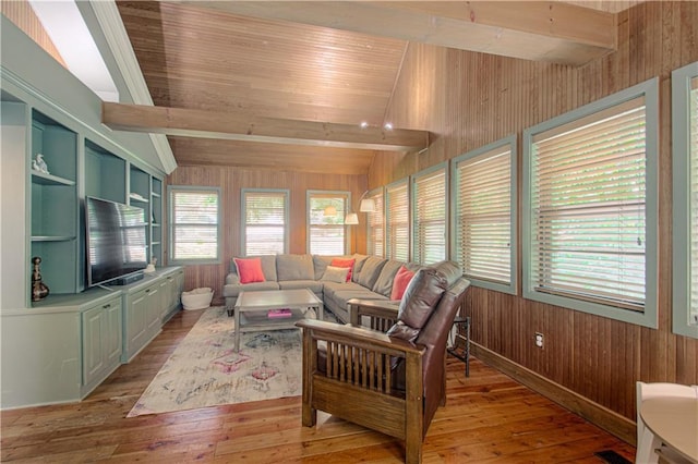 601 NW 41st St, Kansas City, MO 64116 - living area with wood walls, light wood-style floors, and wood ceiling