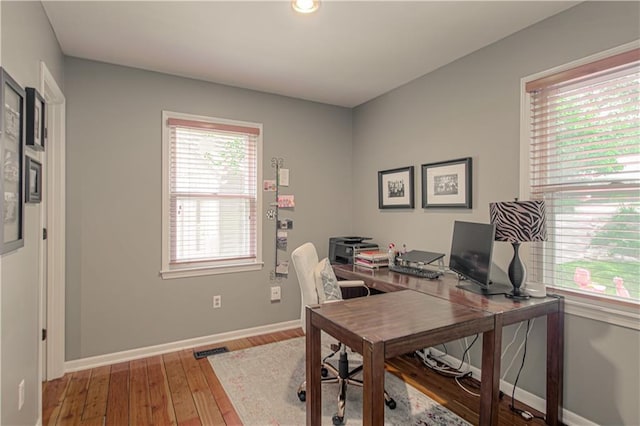 601 NW 41st St, Kansas City, MO 64116 - home office with wood finished floors and baseboards