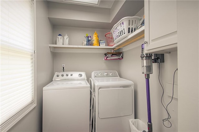 601 NW 41st St, Kansas City, MO 64116 - washroom featuring cabinet space and washer and clothes dryer