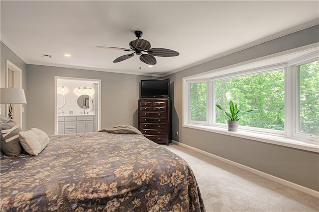 601 NW 41st St, Kansas City, MO 64116 - bedroom with crown molding, light colored carpet, baseboards, ensuite bath, and a ceiling fan