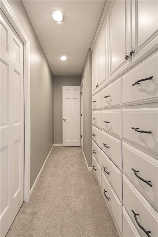 601 NW 41st St, Kansas City, MO 64116 - corridor featuring baseboards, light colored carpet, and recessed lighting