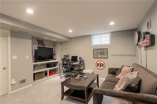601 NW 41st St, Kansas City, MO 64116 - living area with a desk, recessed lighting, carpet flooring, and baseboards