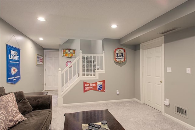 601 NW 41st St, Kansas City, MO 64116 - living room featuring carpet, stairs, baseboards, and recessed lighting