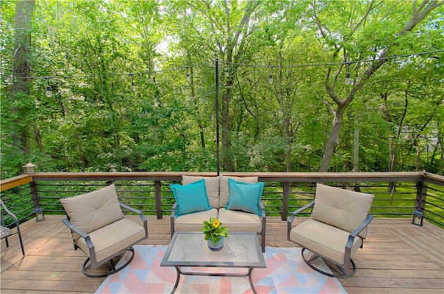 601 NW 41st St, Kansas City, MO 64116 - wooden terrace featuring an outdoor hangout area and a forest view