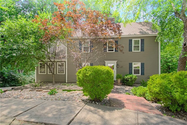 601 NW 41st St, Kansas City, MO 64116 - view of front of house with a chimney