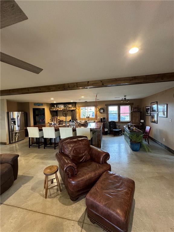 25332 E 250th Ave, Ridgeway, MO 64481 - living area featuring beamed ceiling, recessed lighting, and baseboards