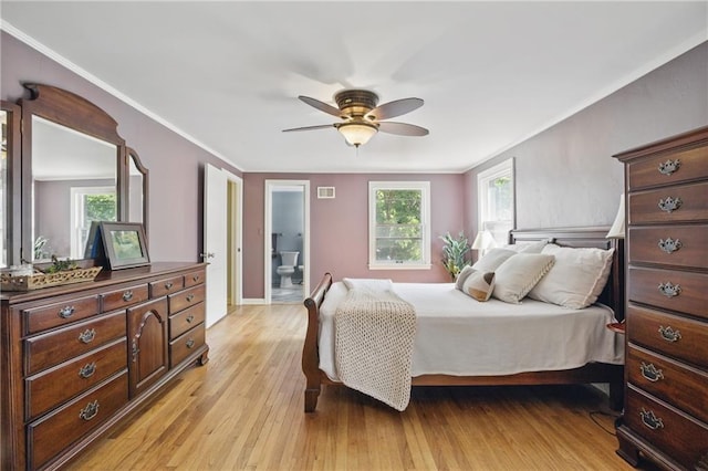 440 E 74th Ter, Kansas City, MO 64131 - bedroom featuring light wood-style floors and crown molding