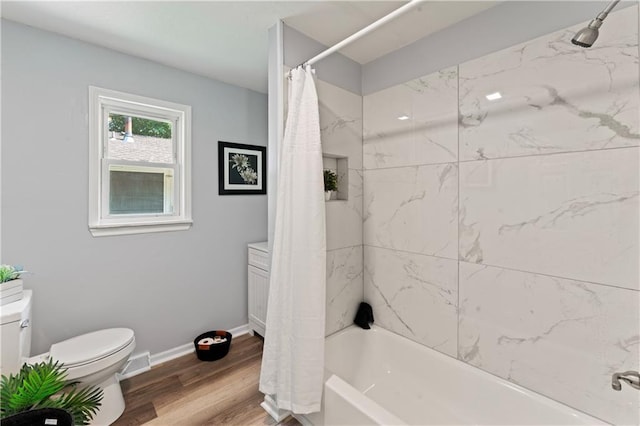 2204 S Cedar Ave, Independence, MO 64052 - full bathroom with toilet, shower / bath combo with shower curtain, wood finished floors, and baseboards