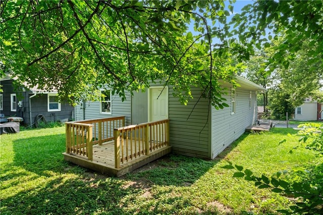 2204 S Cedar Ave, Independence, MO 64052 - rear view of property featuring a wooden deck and a yard