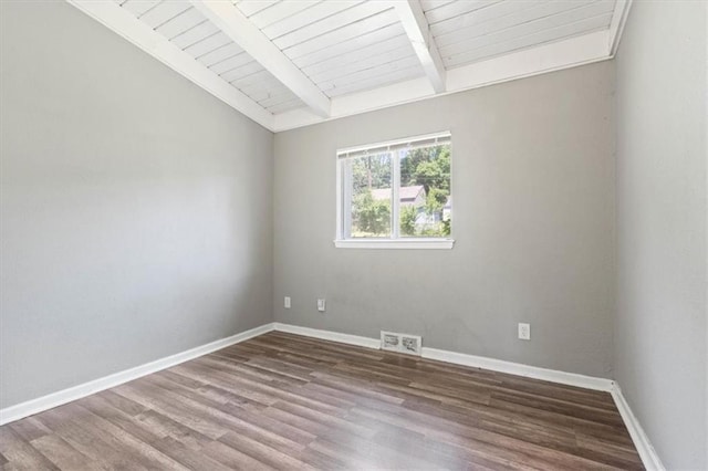 16 W 89th Ter, Kansas City, MO 64114 - spare room featuring wood finished floors, baseboards, and wood ceiling