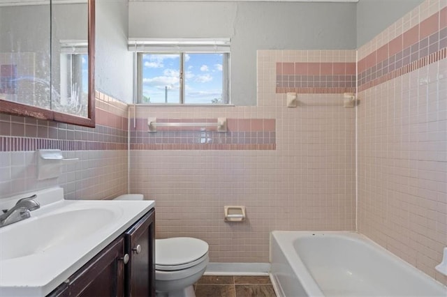 16 W 89th Ter, Kansas City, MO 64114 - full bath with tile walls, a bath, toilet, and vanity